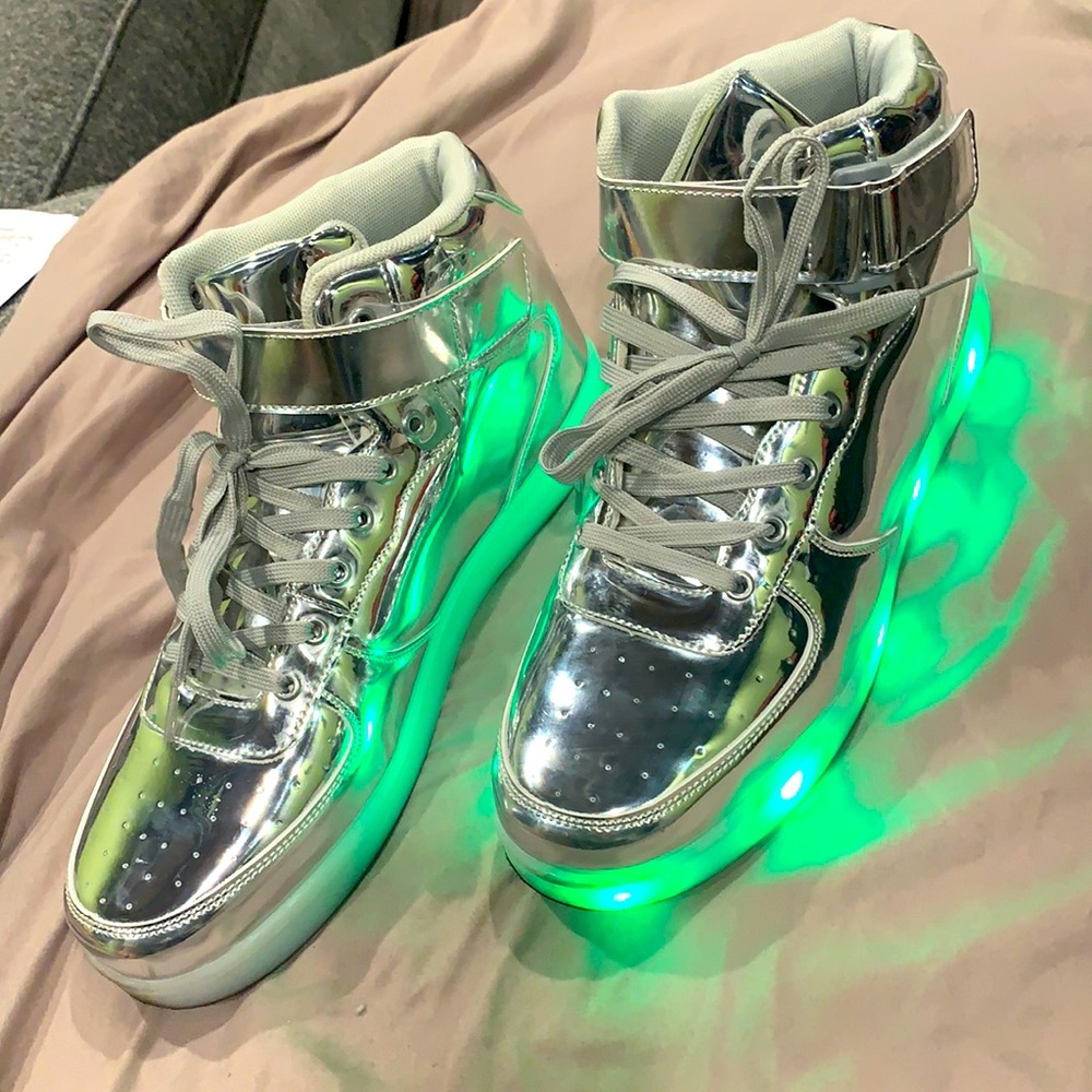 Chrome. Light up soles. Size 11. Only wore one time. They were way too cool 4 me